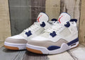 Air Jordan 4 Retro Sneakers – White & Navy Blue
